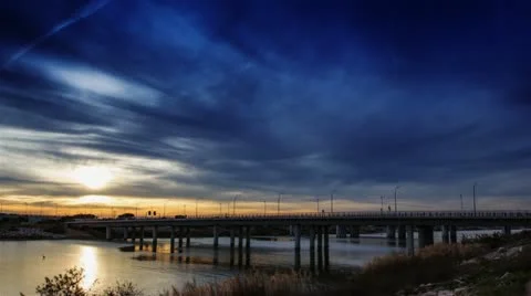 Brigde over the sea sunset - Time Lapse Stockbeeldmateriaal 12766764
