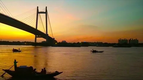Brige over river in india at sunset time  Brige and boat Stock Footage 280329865