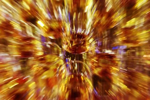 Bright abstract background based on wine glasses with motion blur focus on ce Stock Photos