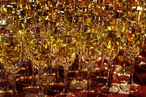 Bright abstract background of glass goblets with wine. Unusual bright abstrac Stock Photos