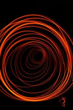 Bright and shining patterns of fire, night entertainment with fire, various p Stock Photos