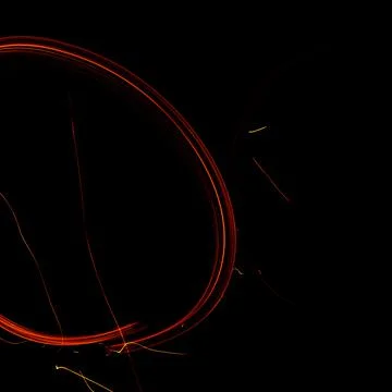 Bright and shining patterns of fire, night entertainment with fire, various p Stock Photos