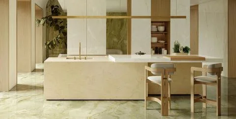 Bright and spacious kitchen features sleek cabinets, a marble island, and sty Stock Photos