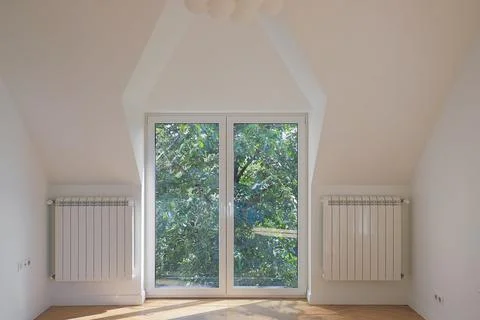 Bright attic window in apartment 스톡 사진