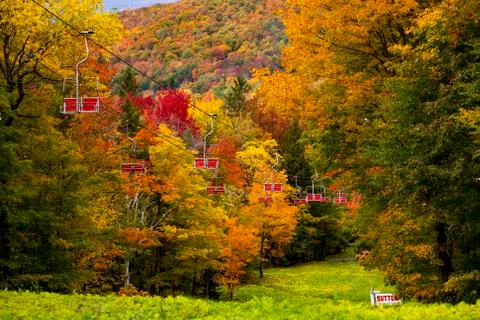  Bright autumn colors with a chair lift at  a ski resort Stock Photos