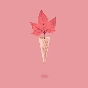 Bright autumn maple leaf in an ice cream waffle cone, seasonal concept イラスト素材