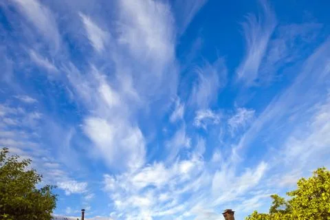 Bright azure sky with clouds Stock Photos