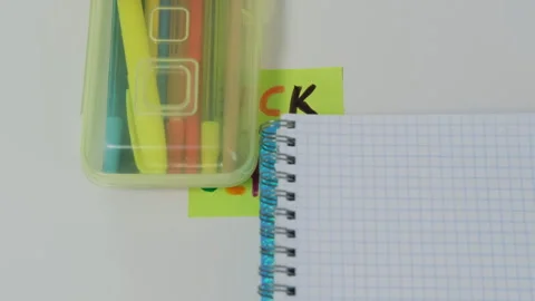 Bright back to school note on empty desk Stock Footage 314091633