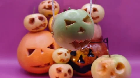 Bright background of spooky fruit-based pumpkins Stock-Footage 344455176