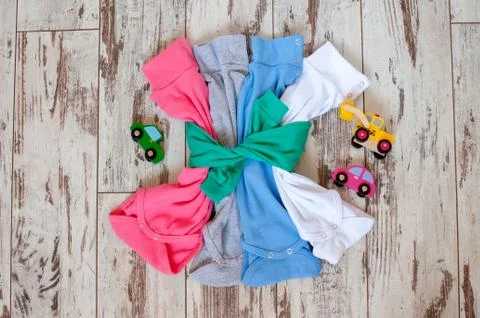 Bright basic children's clothes Stock Photos