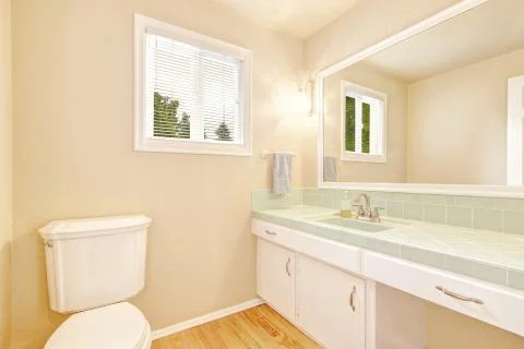 Bright bathroom in light tones Stock Photos