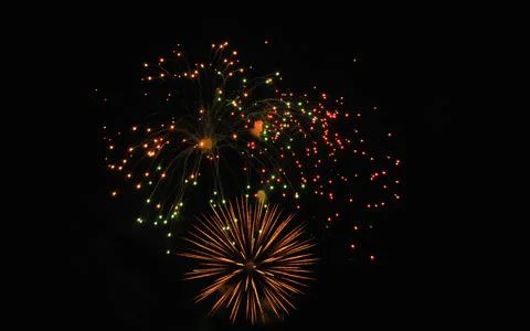 Bright beautiful fireworks close-up. Stock Photos