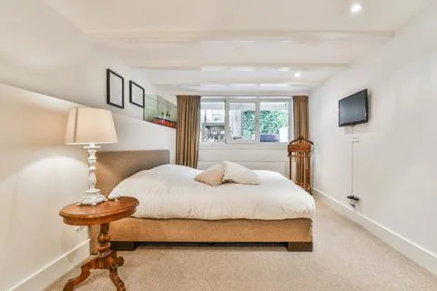 Bright bedroom design Stock Photos