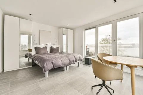 Bright bedroom design Stock Photos