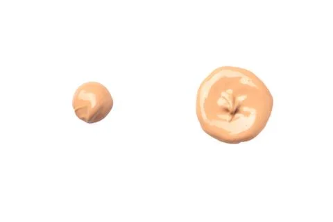 Bright beige smear of foundation circle shaped. Stock Photos