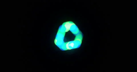 Bright blue and green triangle alien UFO spacecraft light led animation effect Stock Footage 217415597