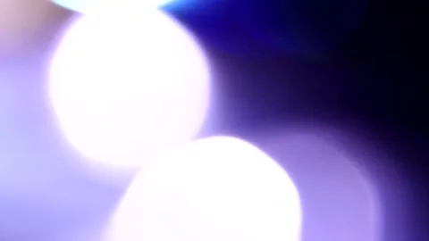 Bright blue and white seven-color bokeh on the left side of the frame Stockbeeldmateriaal 309426853