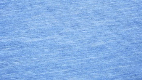 Bright blue background from fabric close-up. Blue spotted fabric Vídeos de archivo 121901358