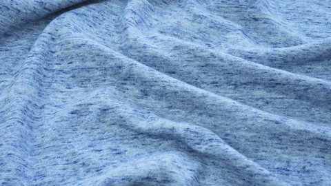 Bright blue background from a fabric close-up. Video stock 121947399