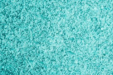 Bright blue background made of solid granite. Stock Photos