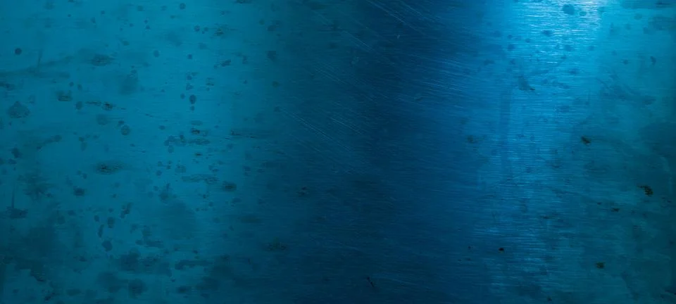 Bright blue background with a solid, uniform tone Stock Photos