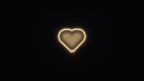Bright blue heart shape glows against dark background Stock Footage 338037876