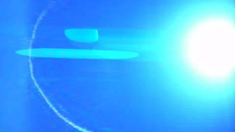 The bright blue light on the black background. anamorphic lens shot Stock Footage 81046856