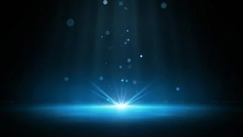 Bright blue light flare with floating glitter particles on a dark background Stock Illustration