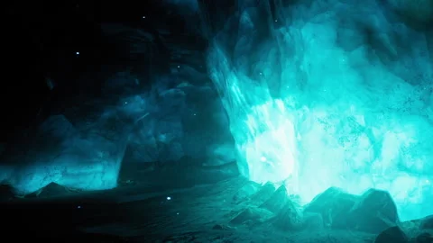 Bright blue light shines in a dark cave with crystal formations Stock Footage 345055858