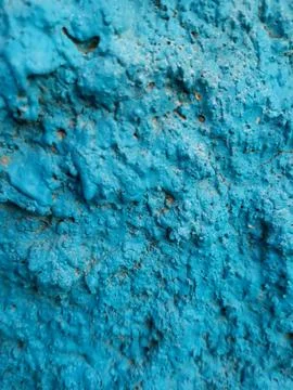 Bright blue rough painted wall texture background Stock Photos