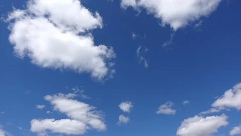 Bright blue sky and white clouds, Time-lapse. Cloud look beautiful in the sky in Stock Footage 110842860
