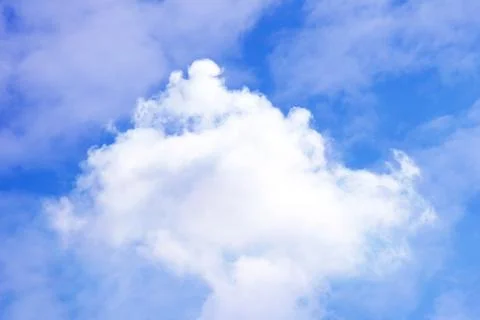 Bright blue sky &amp; clouds as background Stock Photos