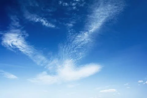 Bright blue sky with clouds Stock Photos