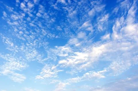 Bright blue sky with clouds Stock Photos