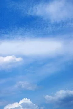 Bright Blue Sky with Different Types of Pure White Clouds 写真素材