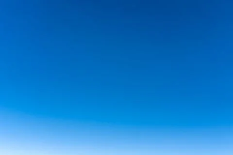 Bright blue sky gradient background. Clear empty sky texture, blank skyscape  Foto stock