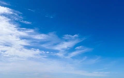 Bright blue sky, hot, soft clouds, fresh wind, nature of spring, Fotos de archivo