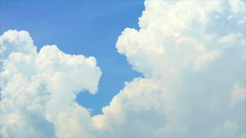 Bright Blue Sky with Large White Cloud Formation and Soft Wispy Clouds in t.. Stock Footage 338216052