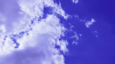 Bright blue sky with soft white clouds timelaps Stock Footage 327592322