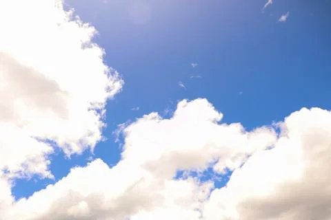 Bright Blue Sky with Solid White Clouds Stock Photos