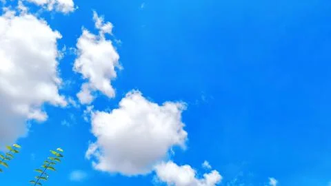 Bright Blue Sky With White Clouds And Fresh Natural Outdoor Background Scene Stock Photos