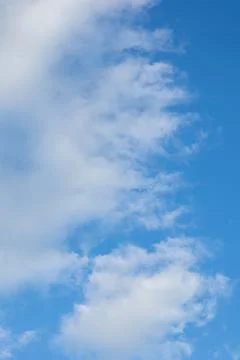 Bright Blue Sky with White Clouds Stock-Fotos