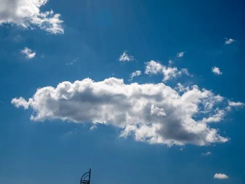 Bright Blue Sky with White Clouds Stock Photos