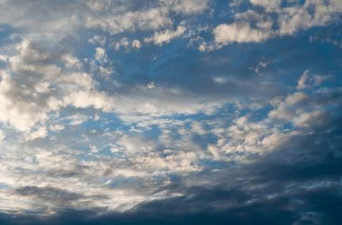 Bright blue sky, white translucent feathery clouds, swirls strong gust, Outdo Stock Photos