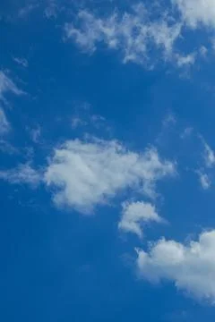 Bright Blue Sky with Wispy Clouds 스톡 사진