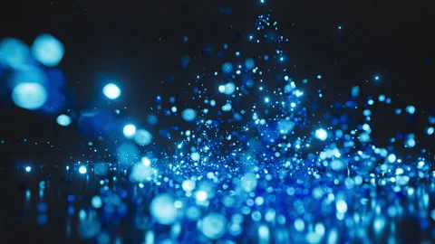 Bright blue sparks appear in the dark, swirl around Video stock 276182012