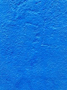 Bright blue wall texture close-up Stock Photos