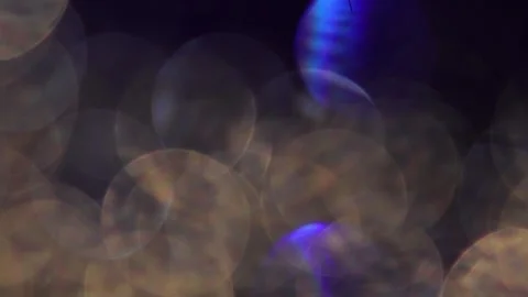 Bright, blurry lights in full-screen blackness Stock Footage 318664011