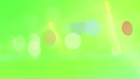 Bright Bokeh Light Leaks and Dreamy Lime Green Lens Flare Overlay Stock Footage 336718643