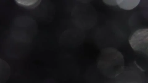 The bright bokeh light stands out on the image in the background. Видео 317457043